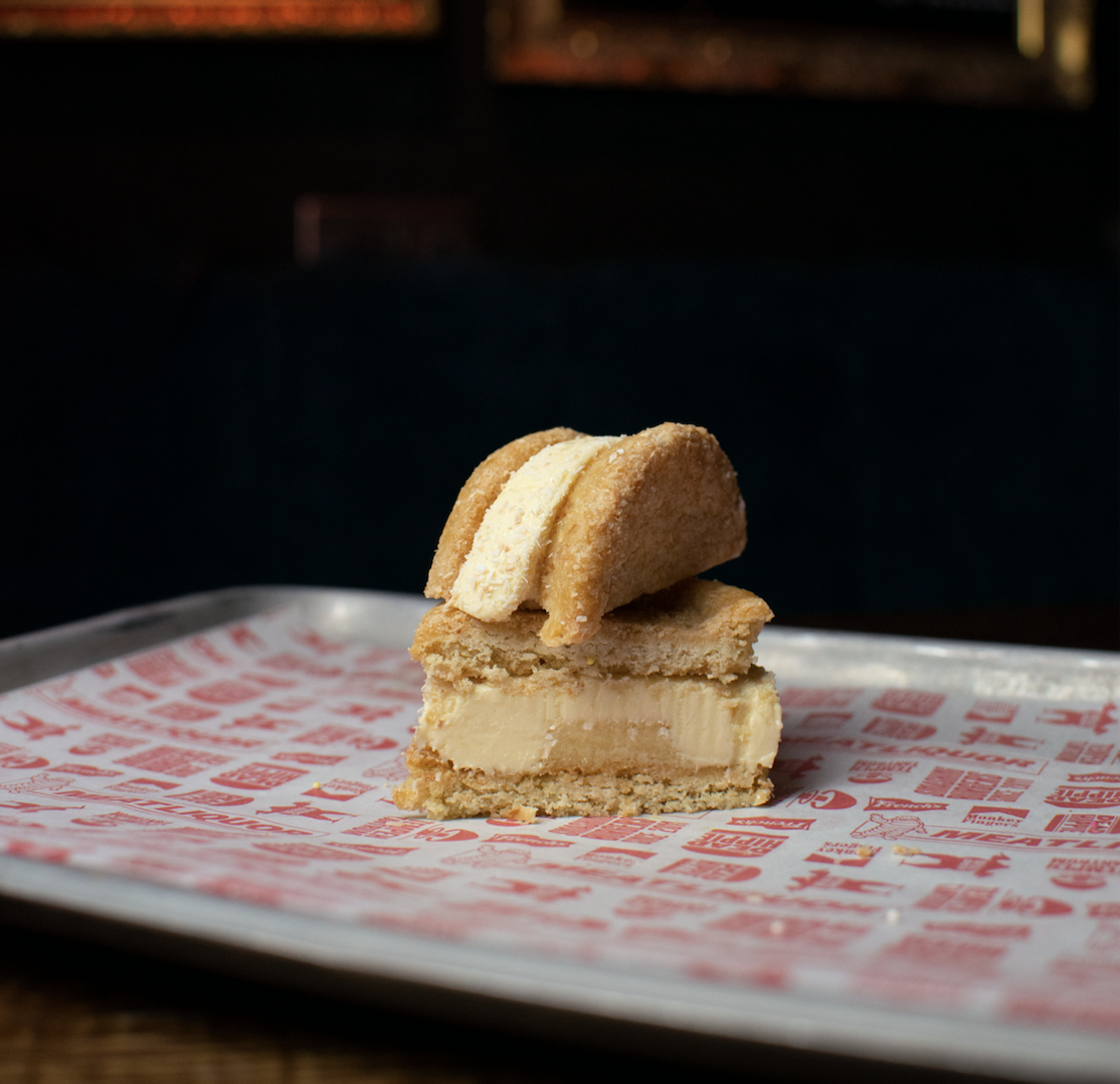 CLWB TROPICA ICE CREAM SANDWICH (PB) | VEGAN ICE CREAM (MADE WITH TINY REBEL'S 'CLWB TROPICA' TROPICAL IPA') BETWEEN TWO TOASTED COCONUT SUGAR COOKIES (CONTAINS A LITTLE ALCOHOL)  Image