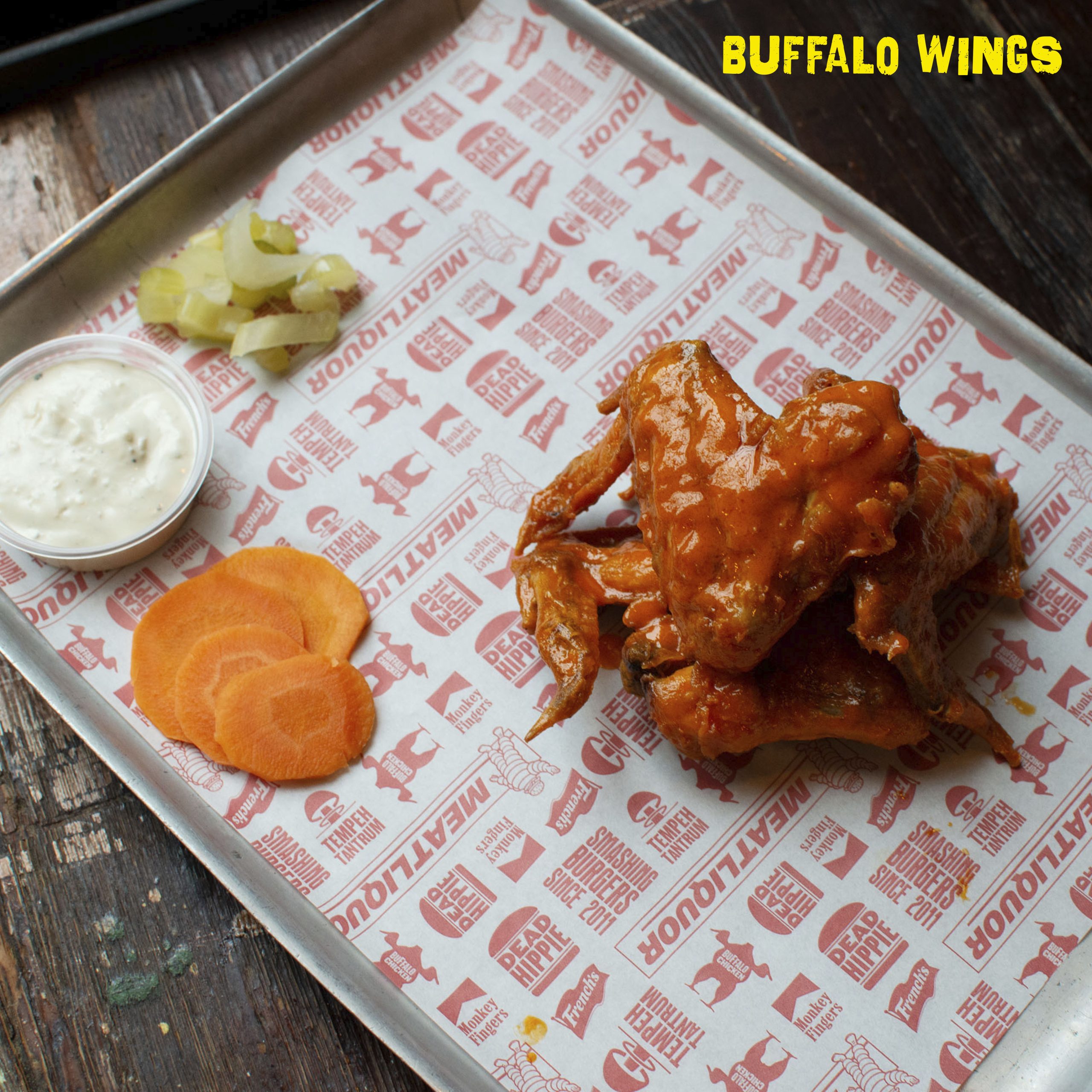 BUFFALO WINGS | 3 POINT CHICKEN WINGS, DEEP FRIED & COATED IN OUR BUFFALO SAUCE Image